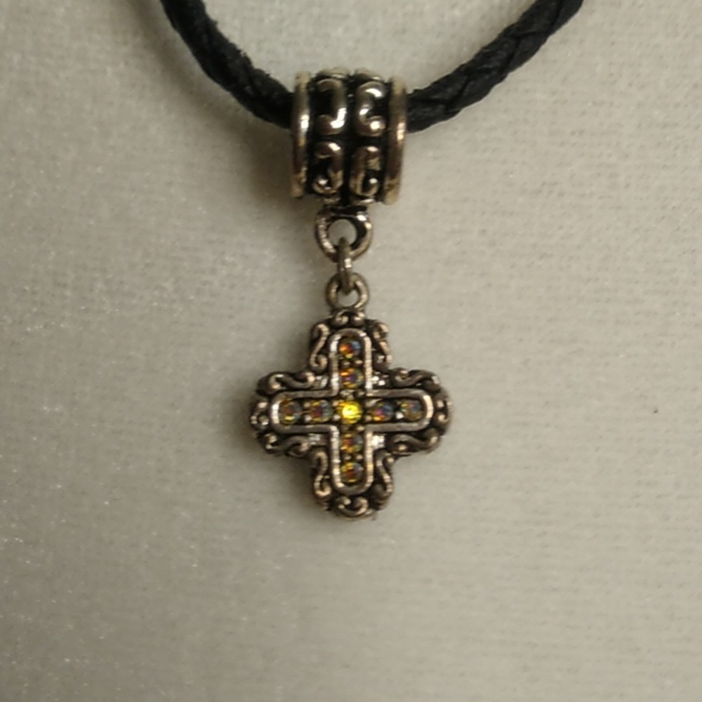 Brighton cross necklace on leather cord with lobster clasp